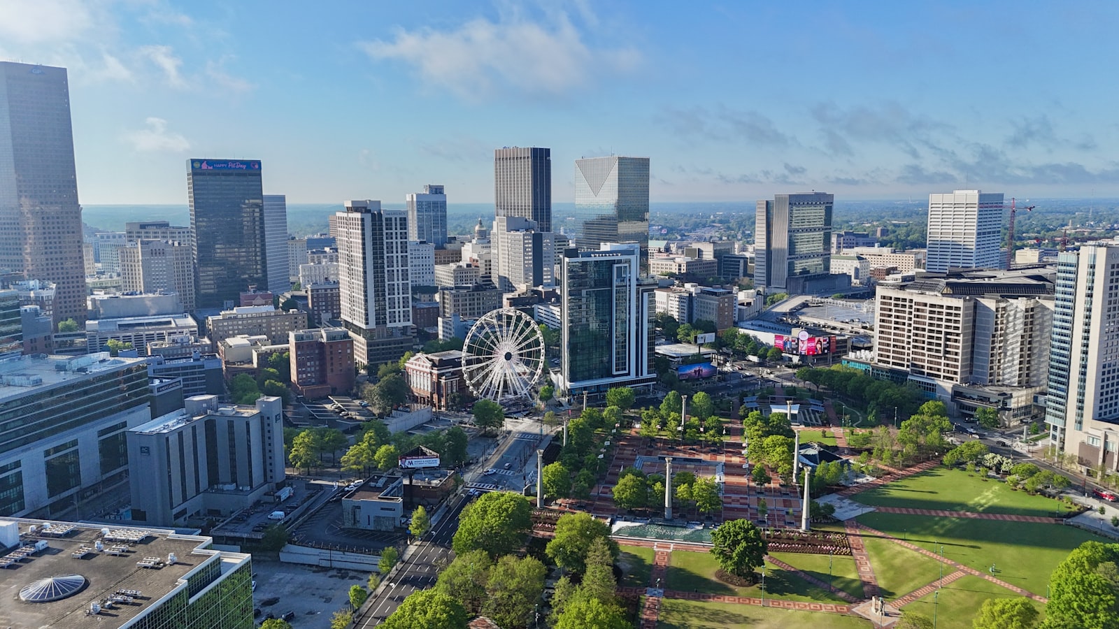 An aerial view of downtown Atlanta in warm daylight.